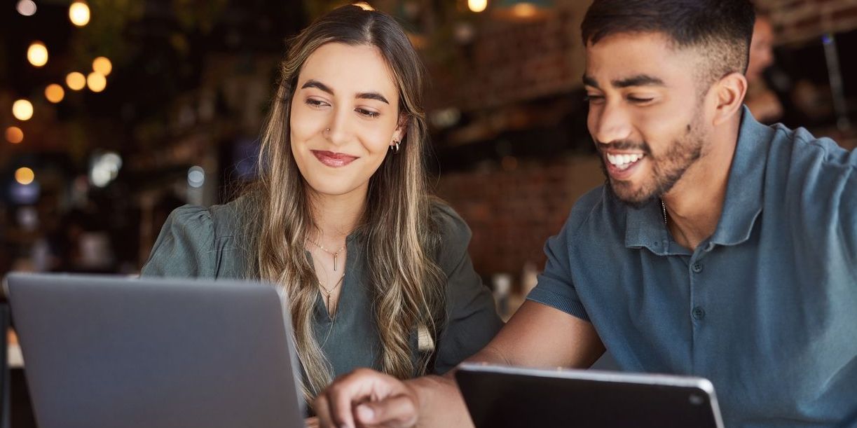 Young mixed couple working on their personal finances